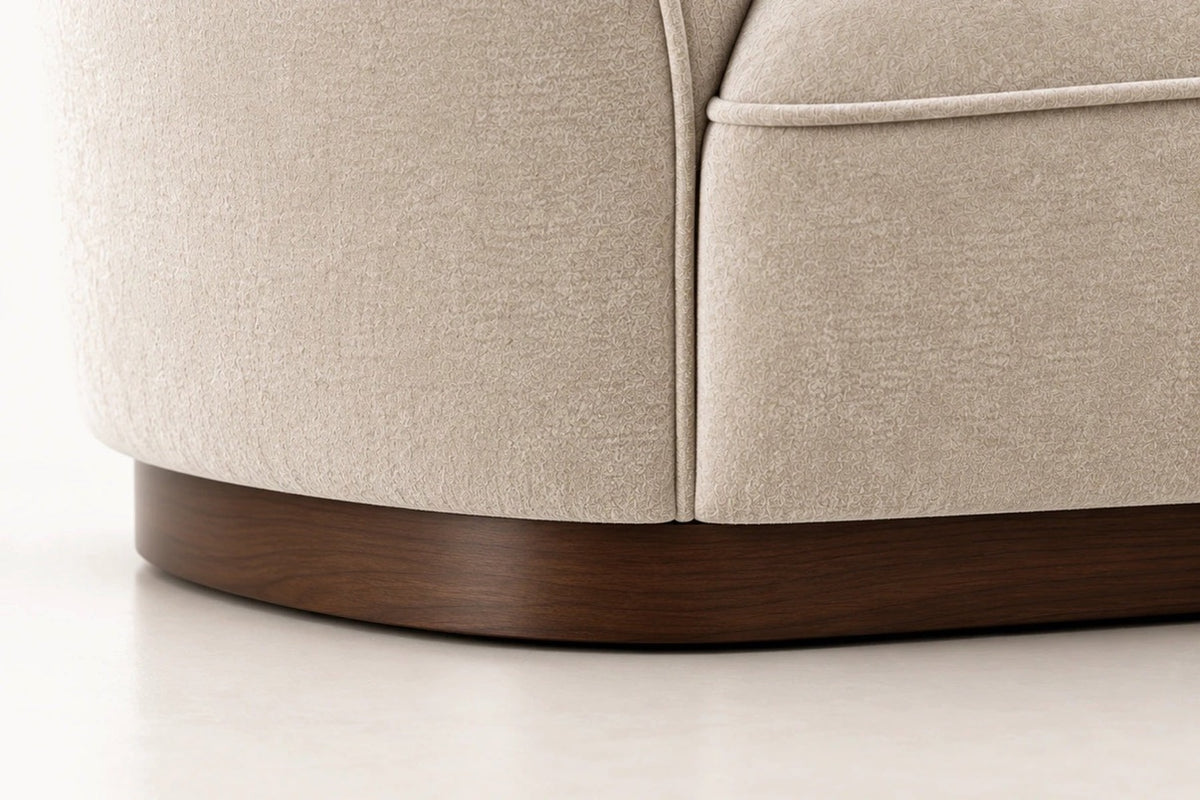 Close-up detail of the Brera tuxedo sofa's plinth base, showing the tailored upholstery and precise seam work.