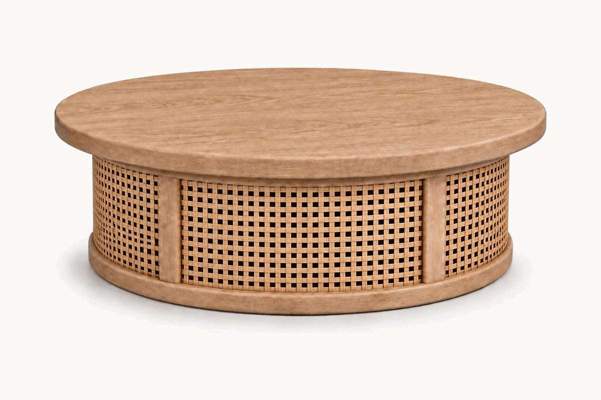 Riviera Round Coffee Table, front view, with a solid oak top on a hand-woven cane drum base