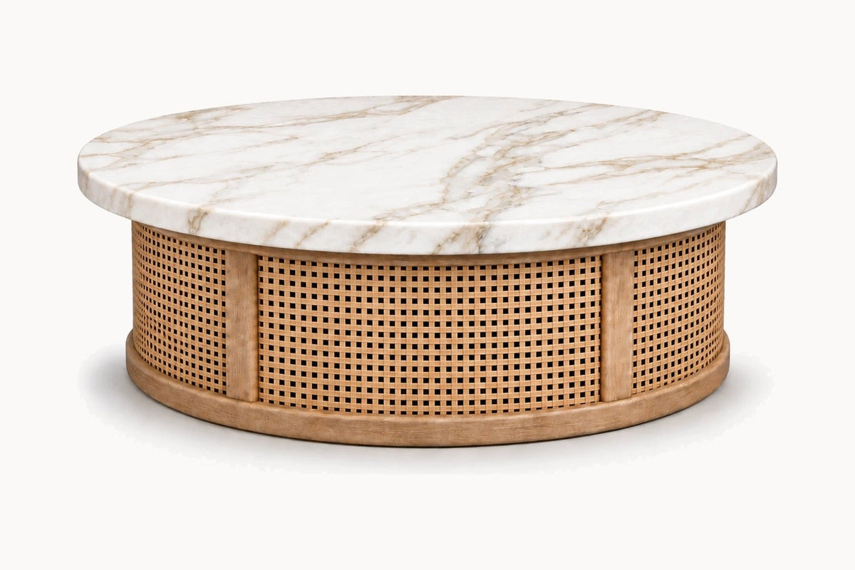 Riviera Round Coffee Table, front view, with a Calacatta Gold marble top on a hand-woven cane drum base