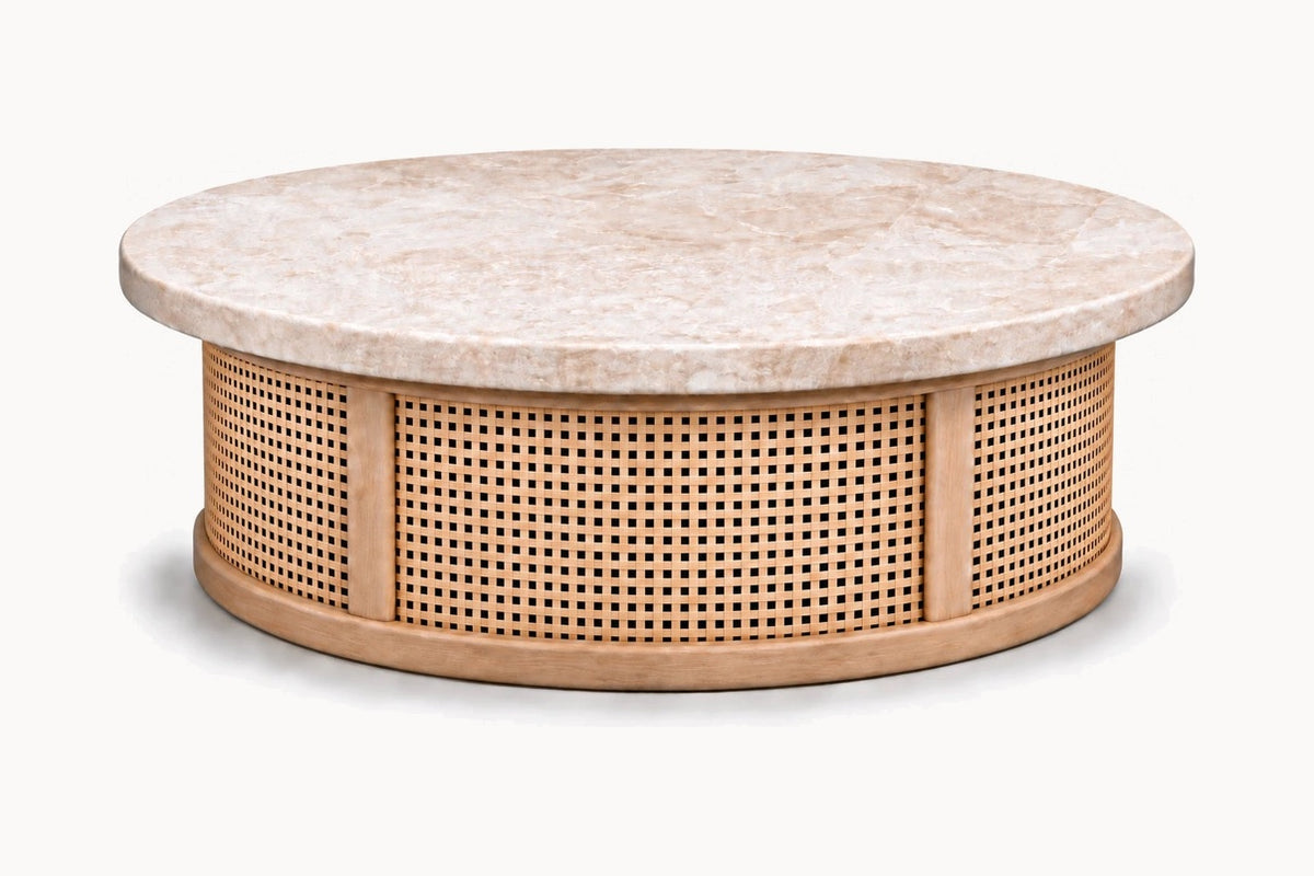 Riviera Round Coffee Table, front view, with a Diana Royal marble top on a hand-woven cane drum base
