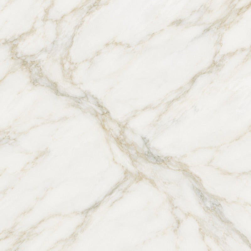 Calacatta Gold marble sample — white stone with honey-gold veining